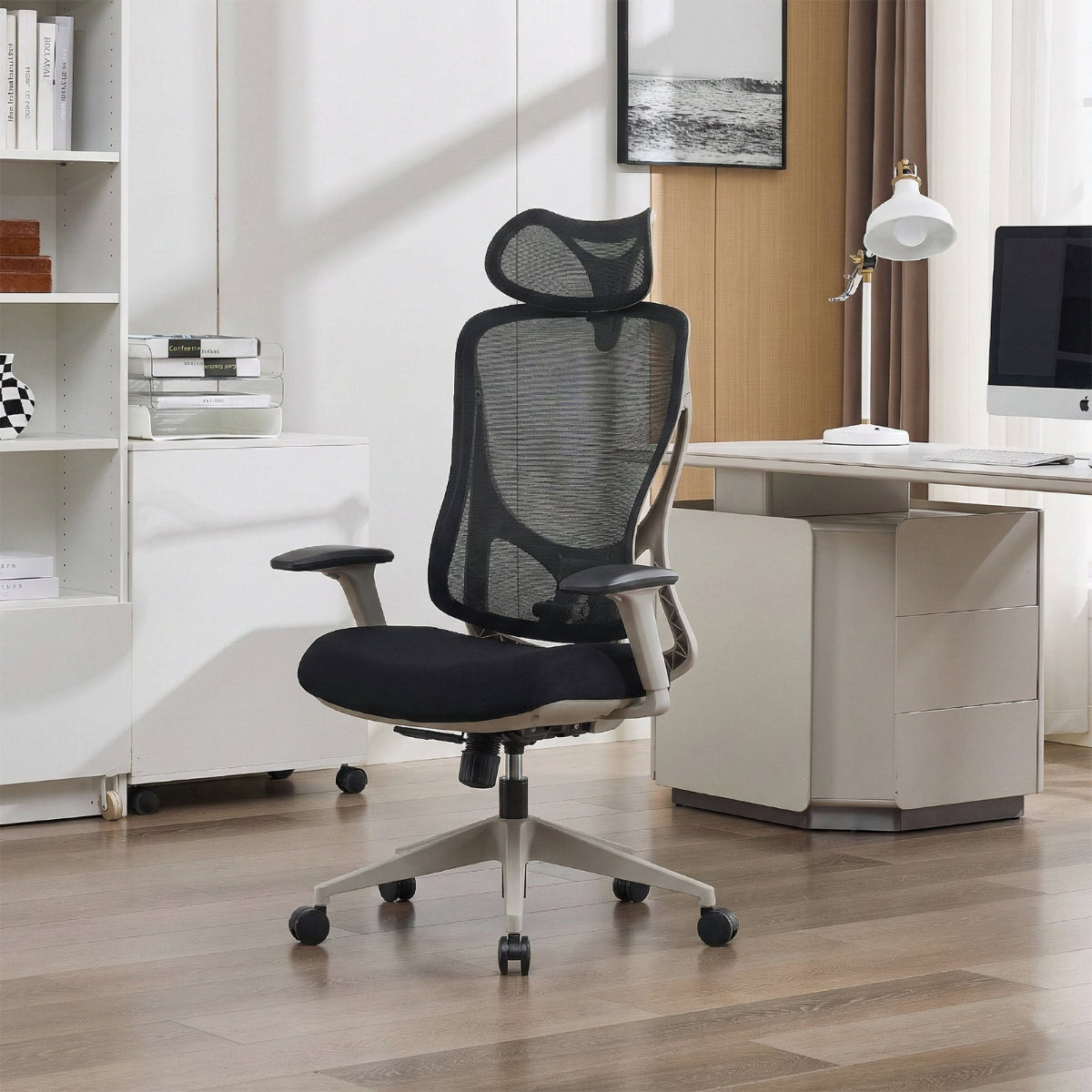 NHO-0026GR,Gray office chair in a modern office setting with a desk and bookshelf.