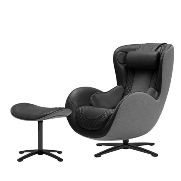 Black massage chair with ottoman on a white background