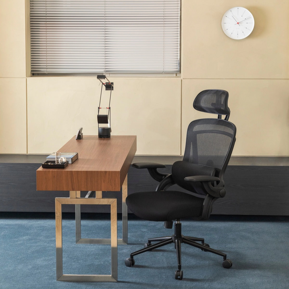 NHO-0013BL,Modern office setup with a wooden desk and black ergonomic chair.