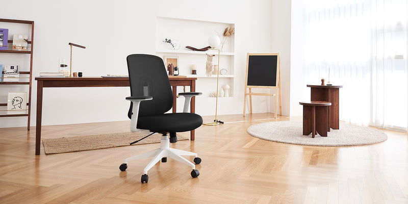 Black Palette Ergonomic Lumbar Adjust Rolling Office Chair in a home office.